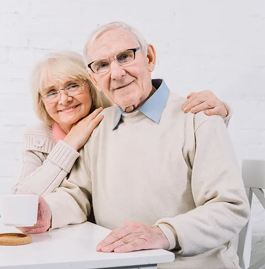 Elderly couple enjoying assisted living together